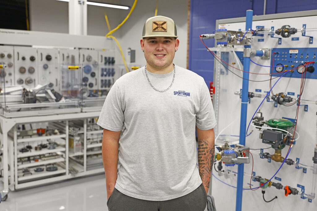 Davis Strickland stands in the Electrical Engineering lab at SCC.