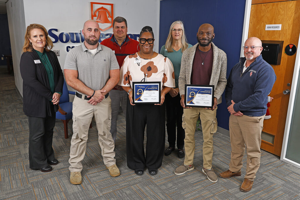 SCC leadership and Transitional Studies representatives hold the vocational challenge awards.