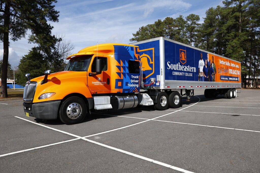 18-Wheeler decorated with SCC logos and imagery dedicated to Truck Driver Training at Southeastern Community College