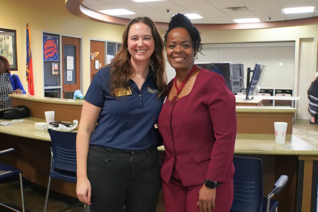 Denise Young and Paige Schneider in the Nesmith Student Center at the Spring Advisory Committee Meeting