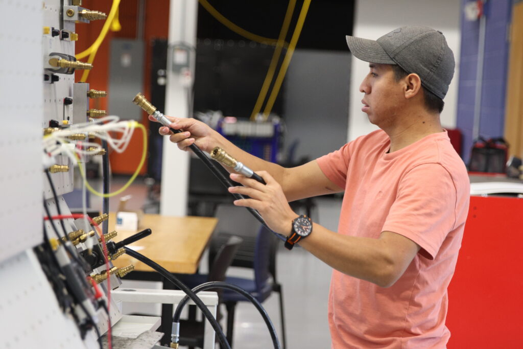Adult Learning working in electrical engineering lab
