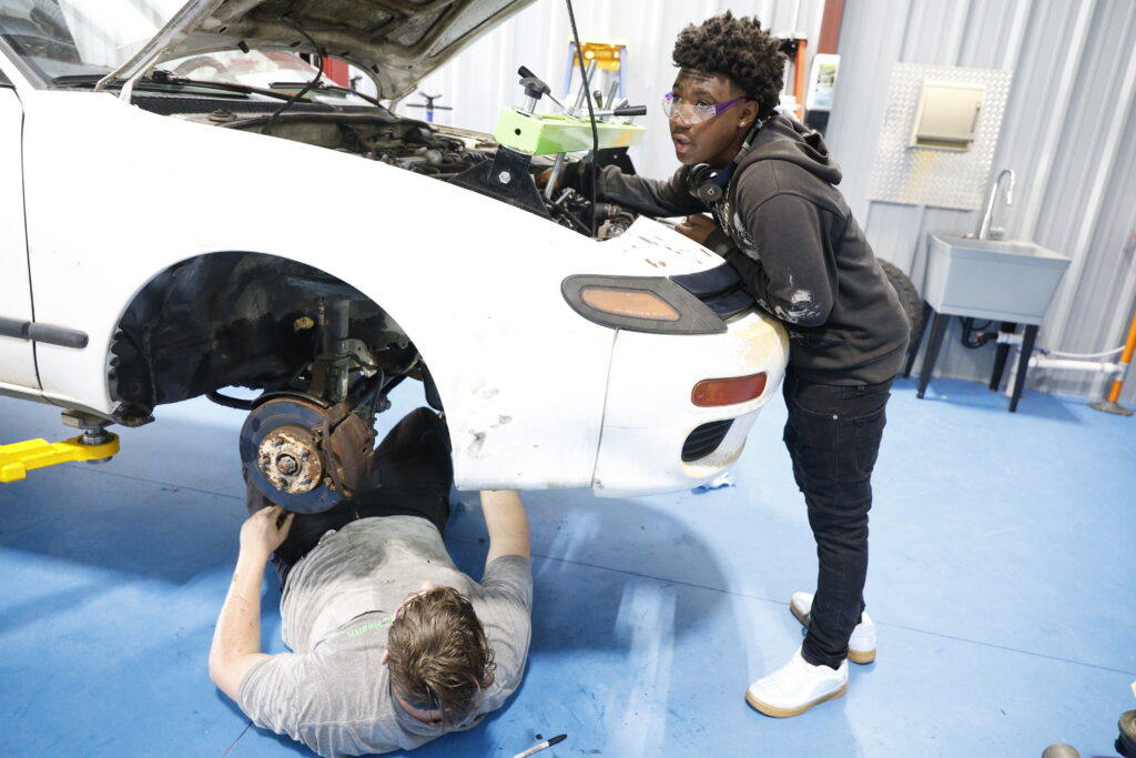Summer Camps students participate in hands-on activity during Automotive summer camp