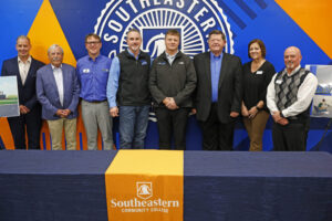 SCC Representatives and Black's Tore and Auto Service smiling for a photo