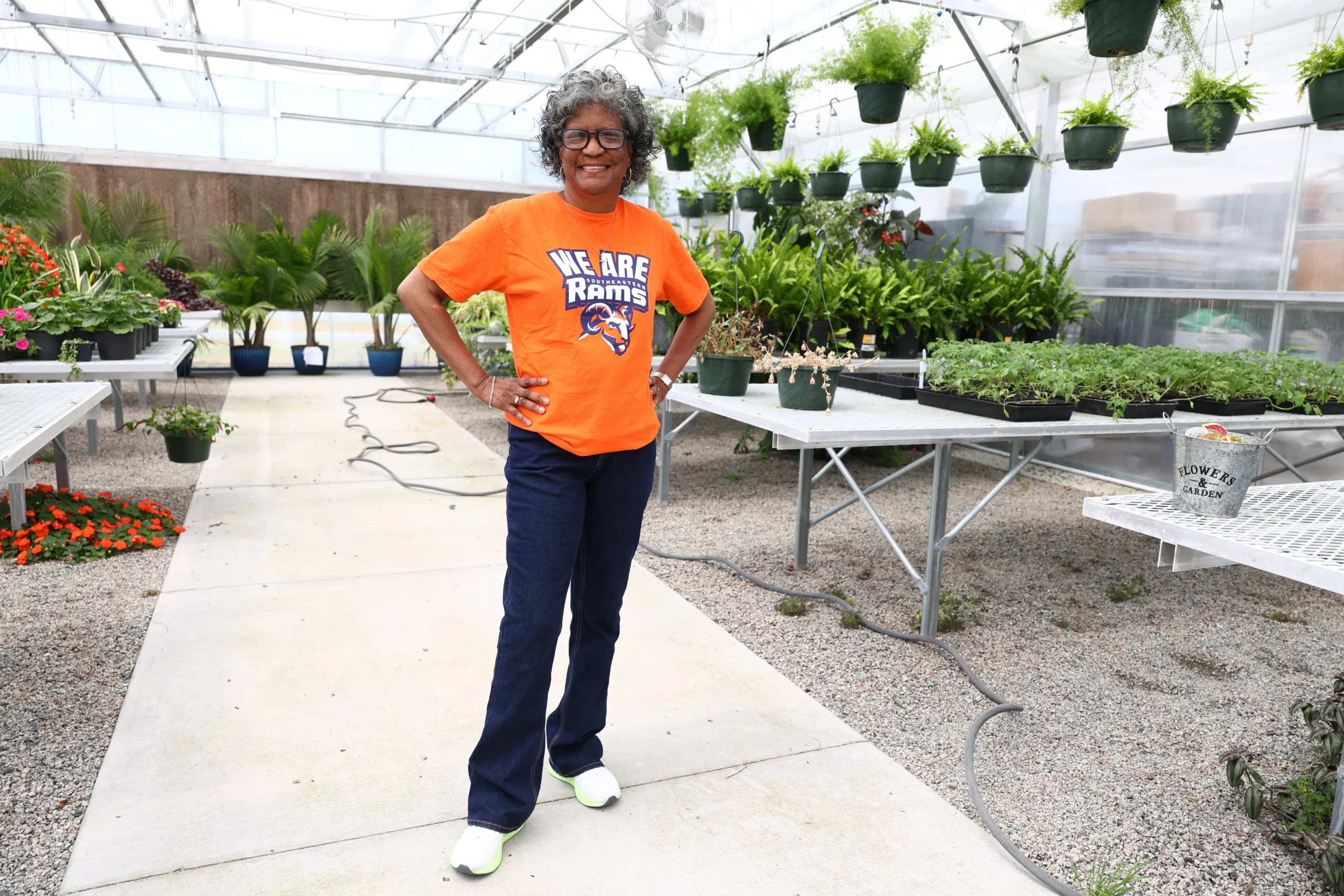 SCC Employee in Greenhouse