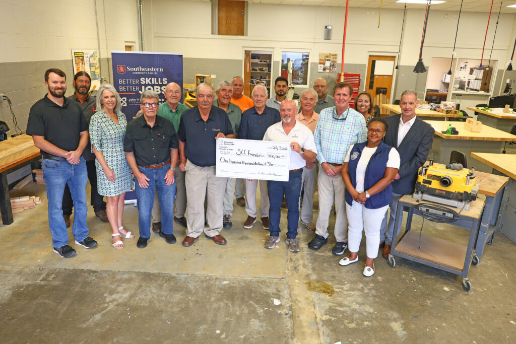 Columbus County Home Builders Association presents a check to Southeastern Community College.