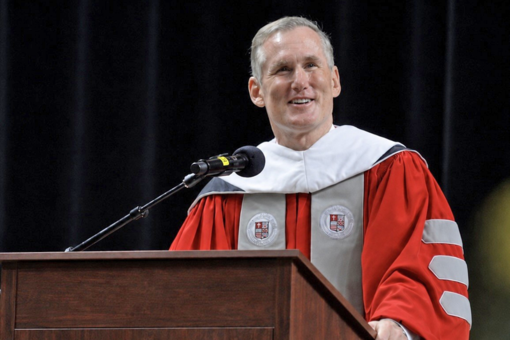 Brian Hamilton speaking at a ceremony.