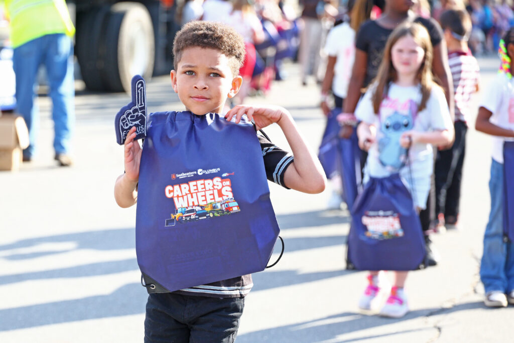 A student walks to his next station at Careers on Wheels back in March.